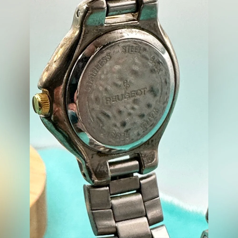 EUC Peugeot Black and Silver Watch